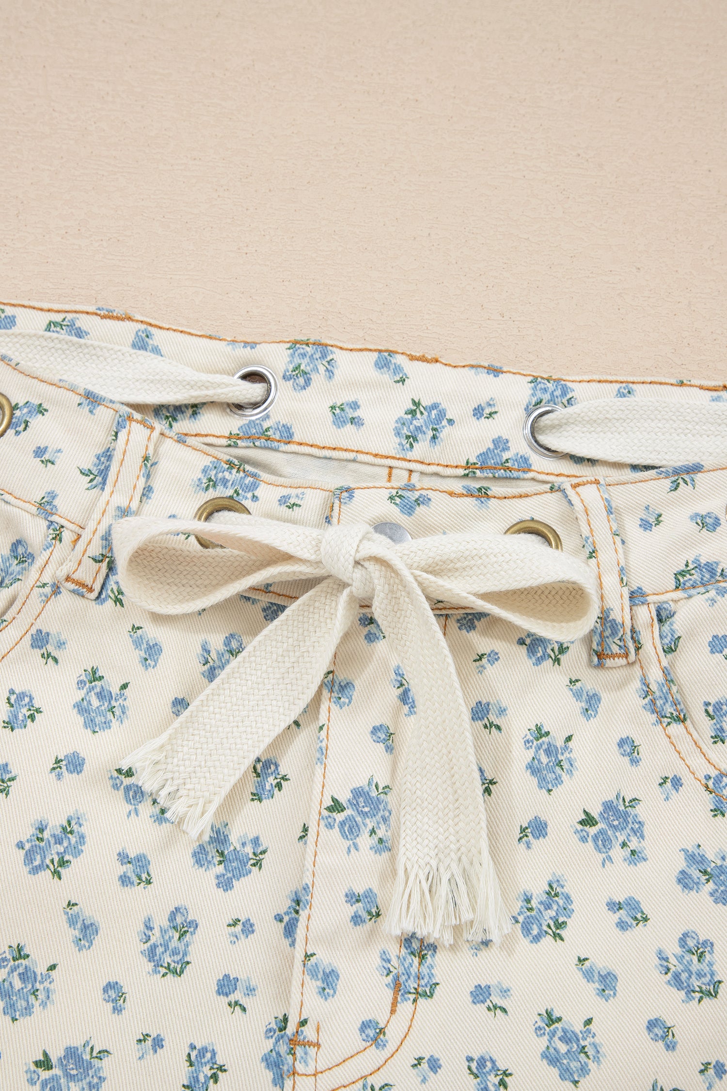Beige Grommet Knot Waist Floral Barrel Leg Jeans